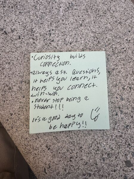 Handwritten sticky note with words of encouragement